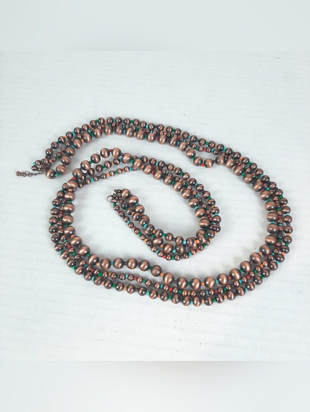 Beautiful copper tone beaded multi-strand necklace